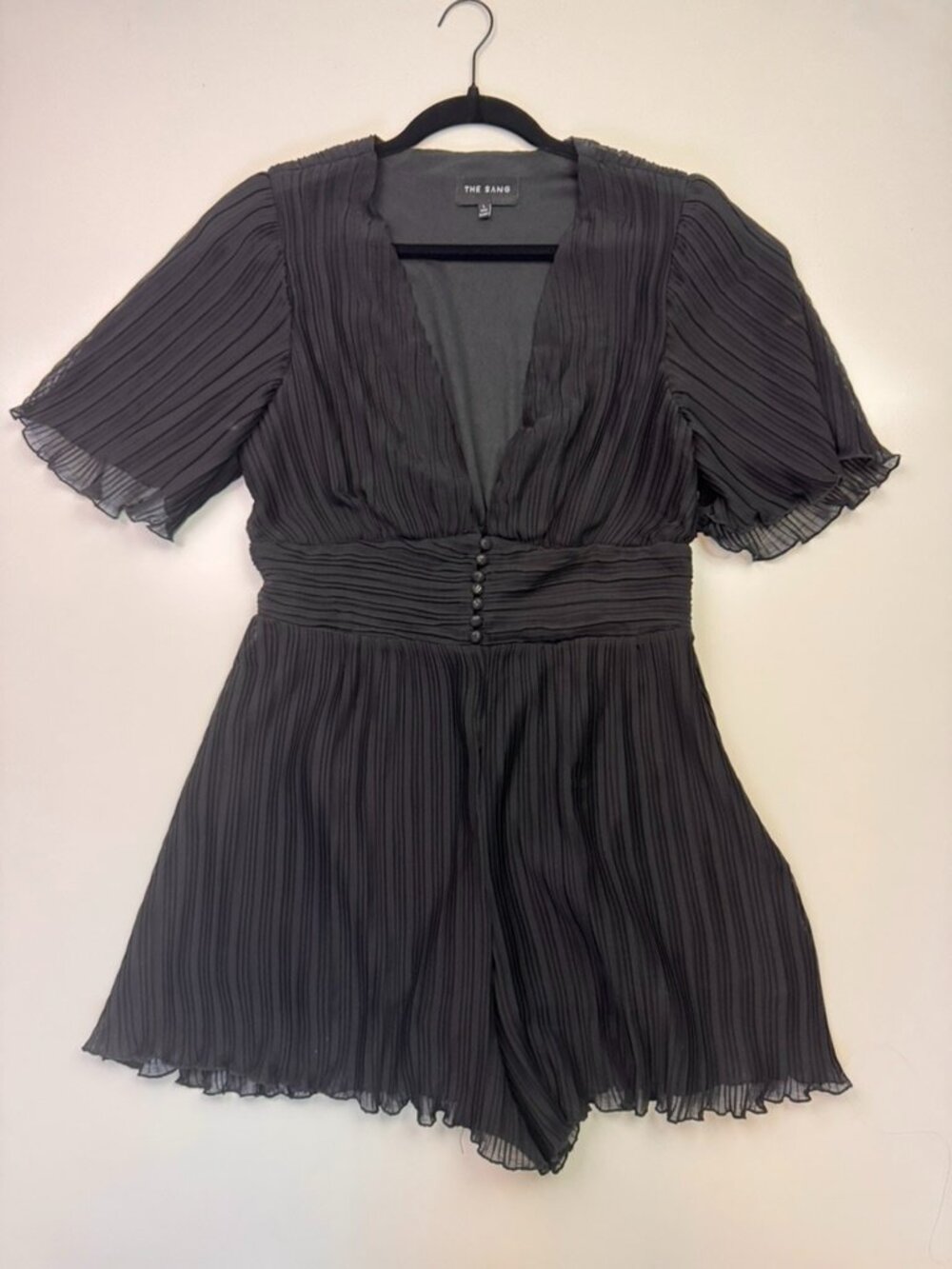 The Sang Black Pleated Romper – Women’s Large – Deep V